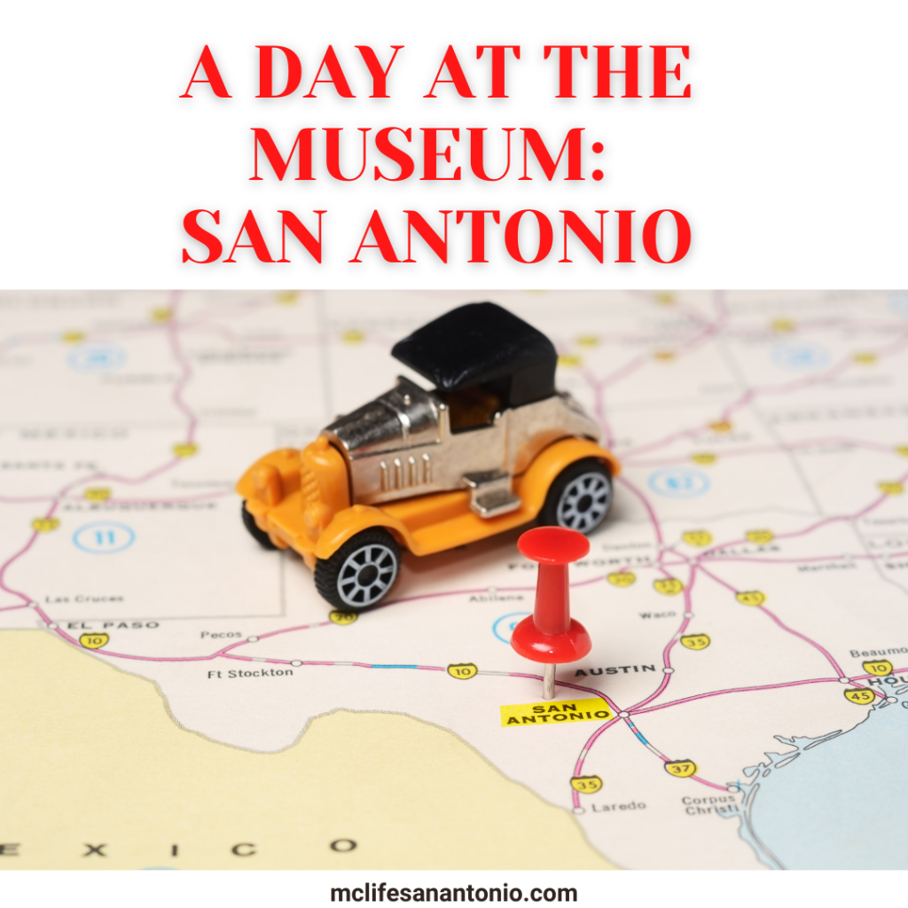 Image shows a toy car sitting on a map with a red pin in the city marked "San Antonio." Text reads "A Day at the Museum: San Antonio"