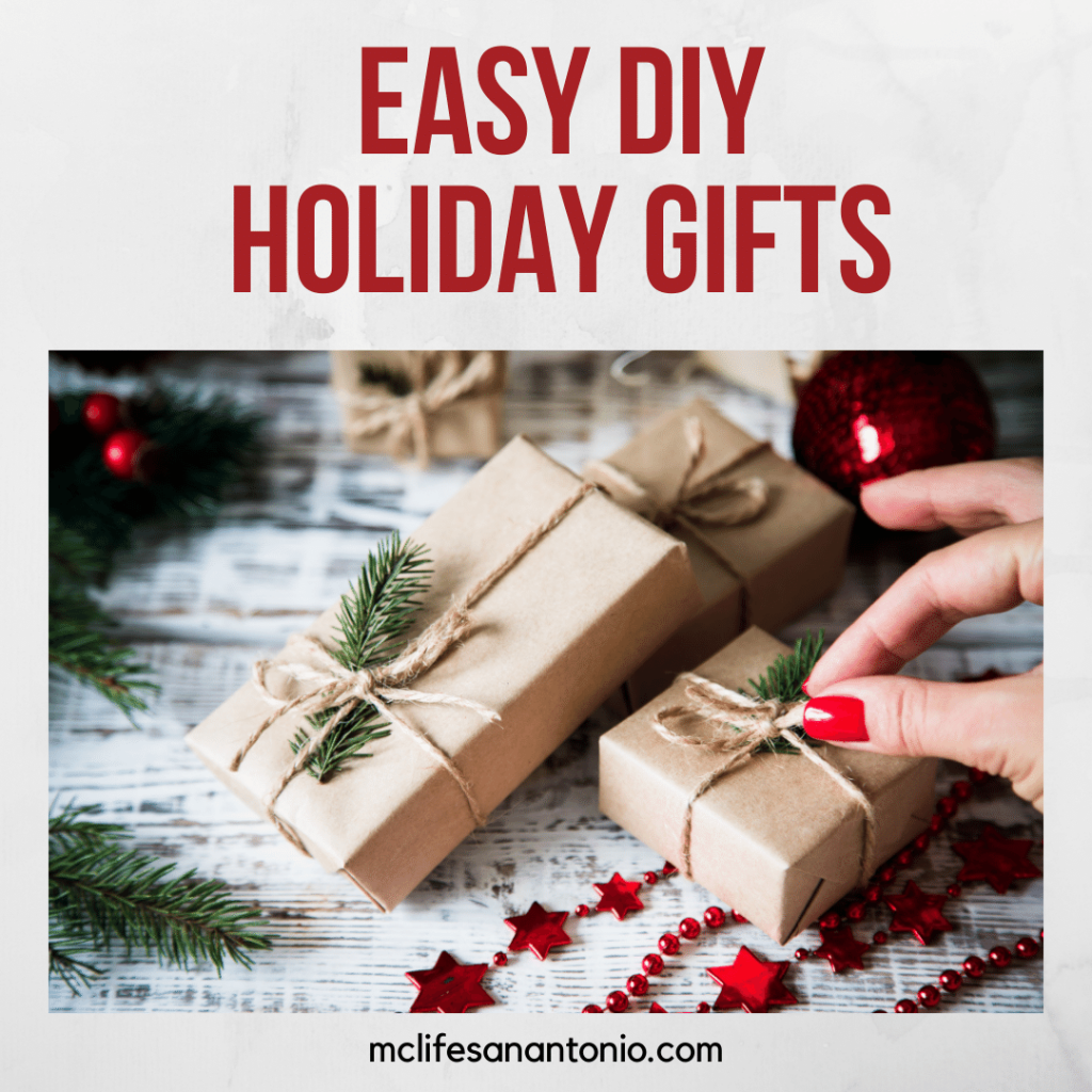 Image shows a hand touching small gift wrapped presents. Text reads "Easy DIY Holiday Gifts"