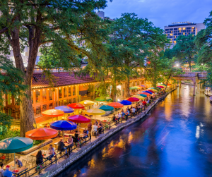 a view of the river walk at night in San Antonio